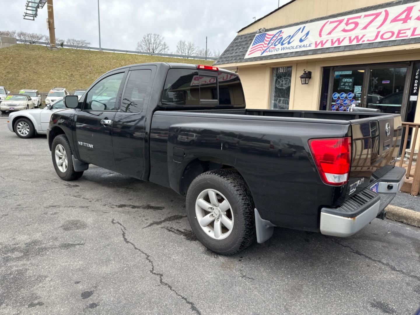 2010 Black Nissan Titan (1N6BA0CH4AN) , located at 5700 Curlew Drive, Norfolk, VA, 23502, (757) 455-6330, 36.841885, -76.209412 - Photo#2